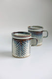Icicle Fishtail Carved Mug with Lid
