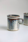 Icicle Fishtail Carved Mug with Lid